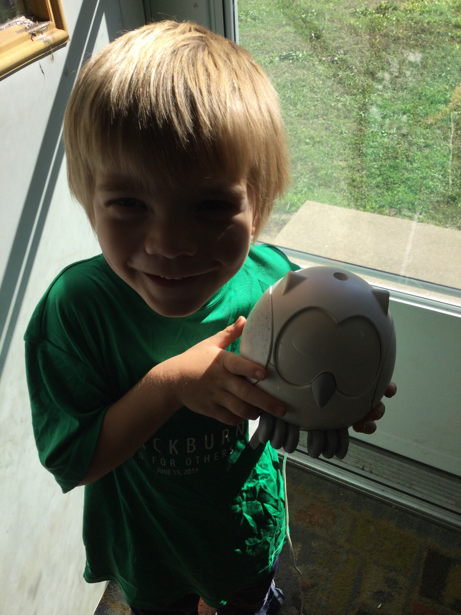 Jerome in 2021 with Snowy the owl diffuser, who he thinks looks like Hedgewig from Harry Potter.