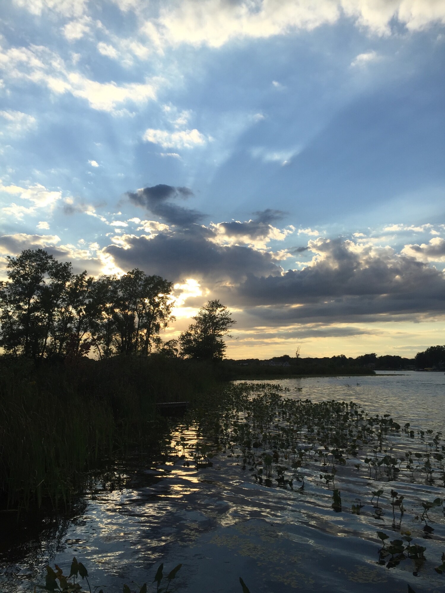 This sunset over Lake Wawasee (Conklin Bay) is part of why we love living in northern IN lake country!