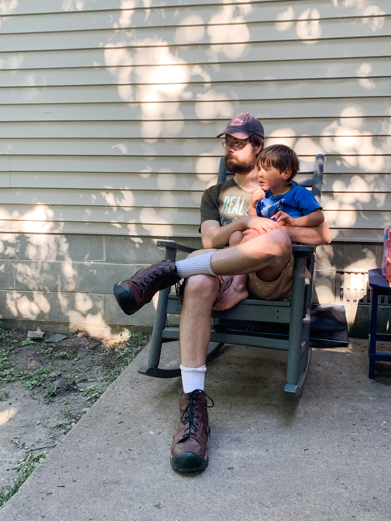 My husband, enjoying our Fathers Day BBQ with our youngest. He goes through a LOT of socks. And we still love him.