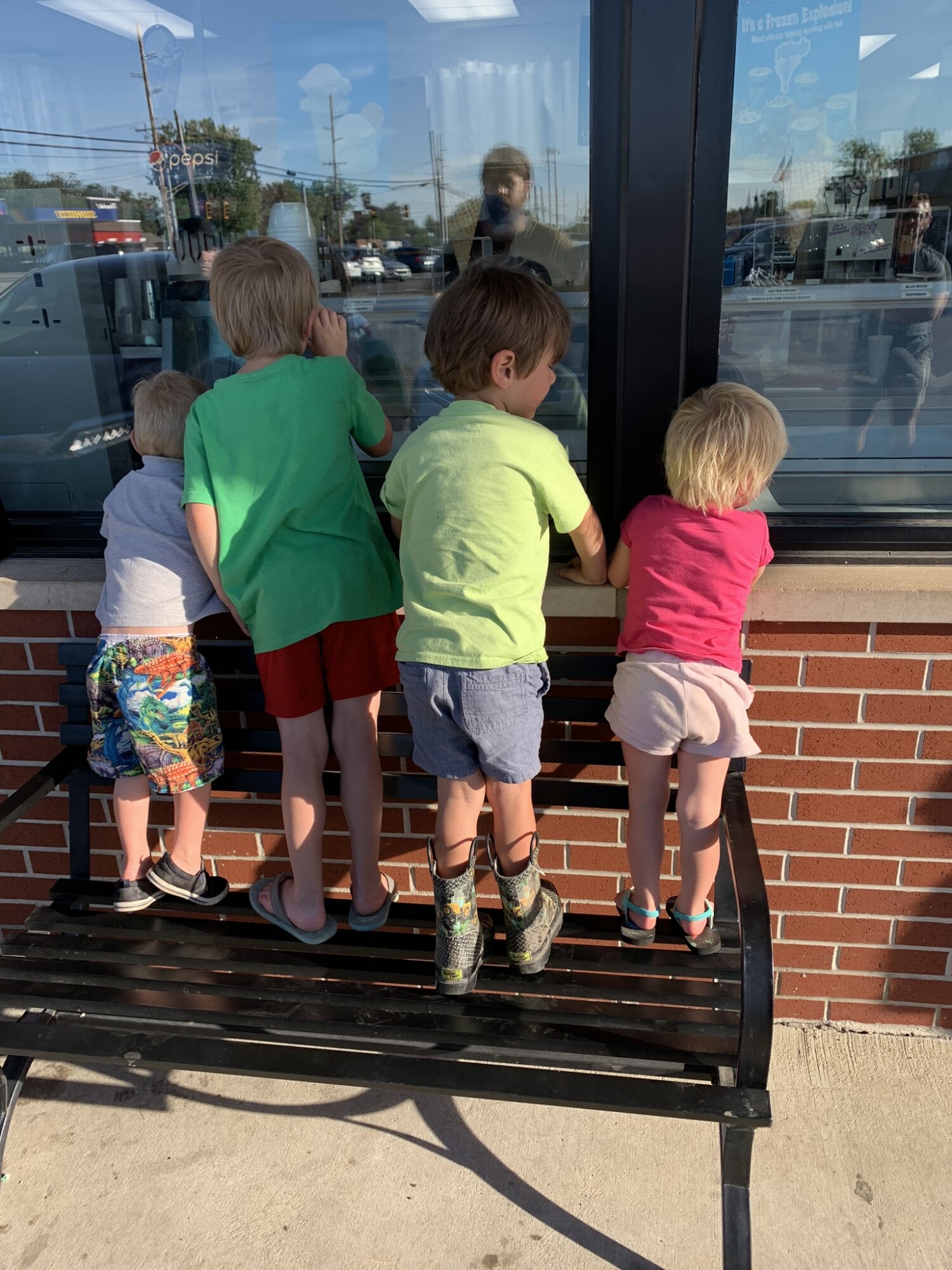 My kids waiting on their ice cream the other night… because we all went out for ice cream (with sprinkles) because I made my June goal & they helped!