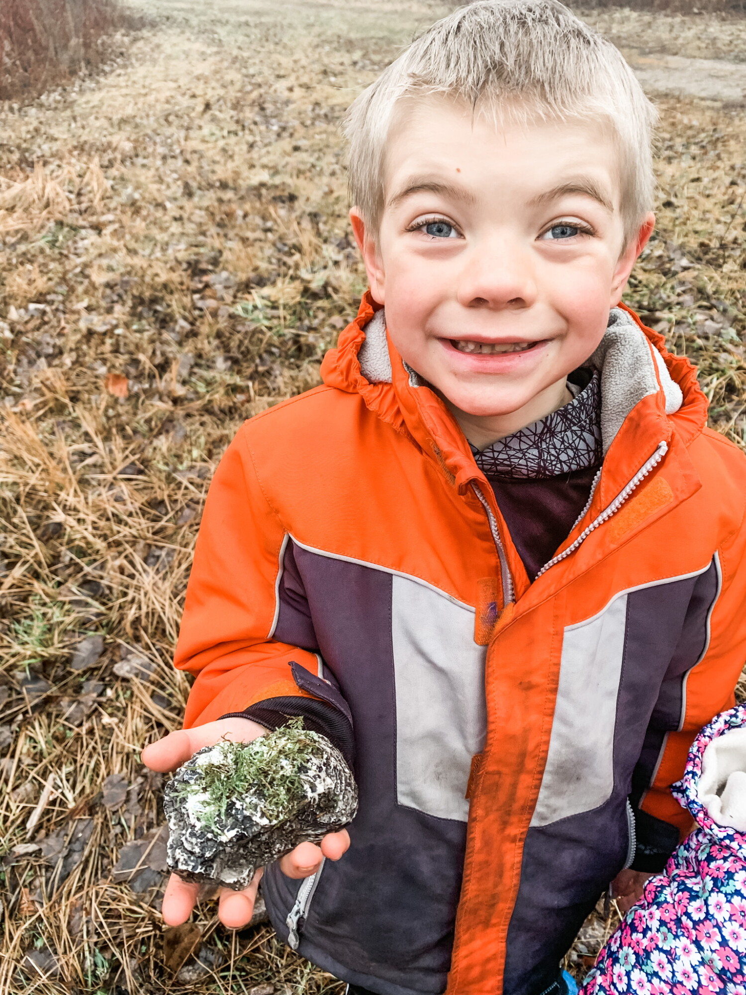 My oldest, J, with a brand new cache we found Jan 1st! It was well hidden so we were extra proud of finding it!