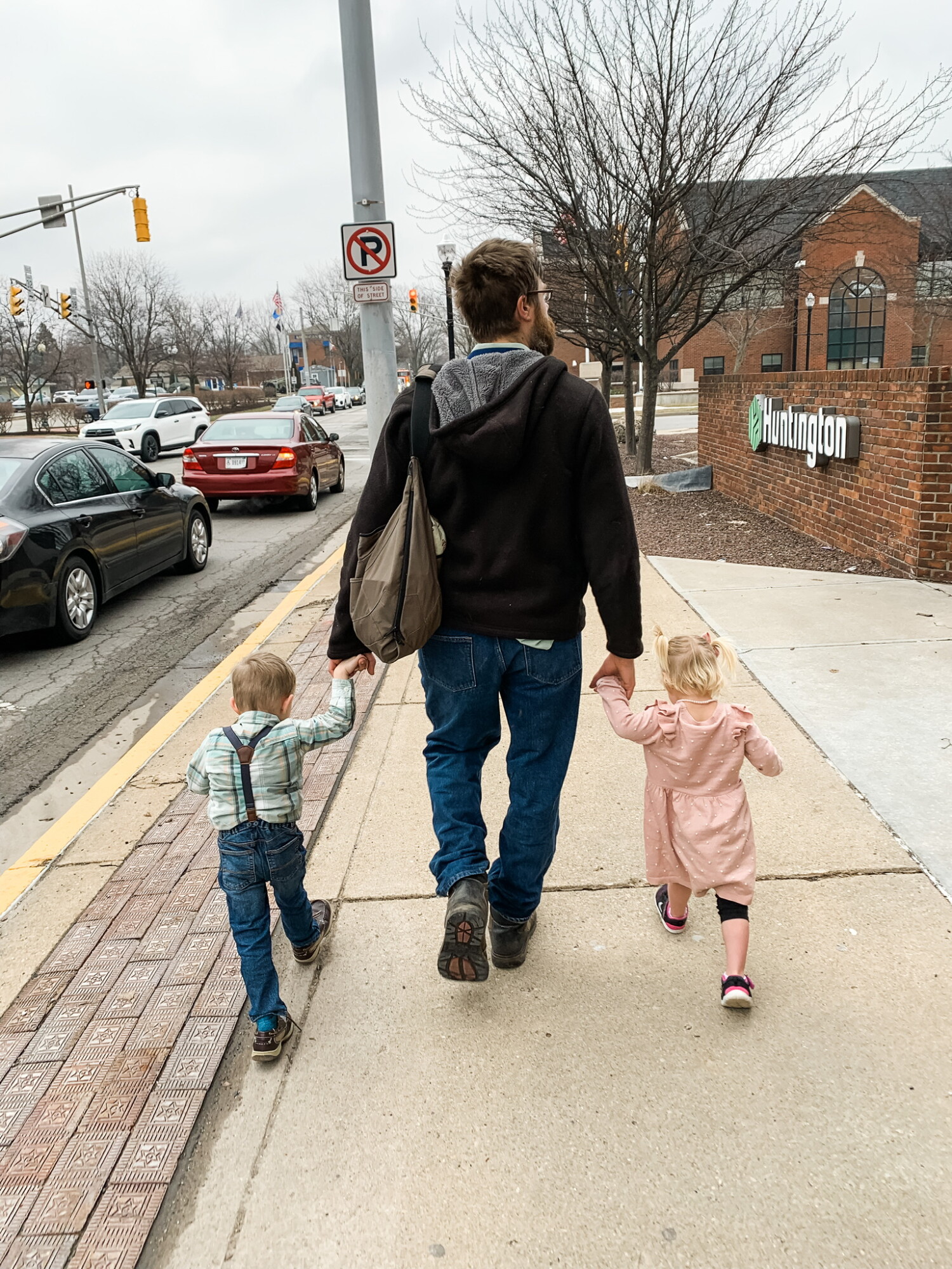 Sam, my husband, with our (then) foster children on the way to the courthouse to be adopted!