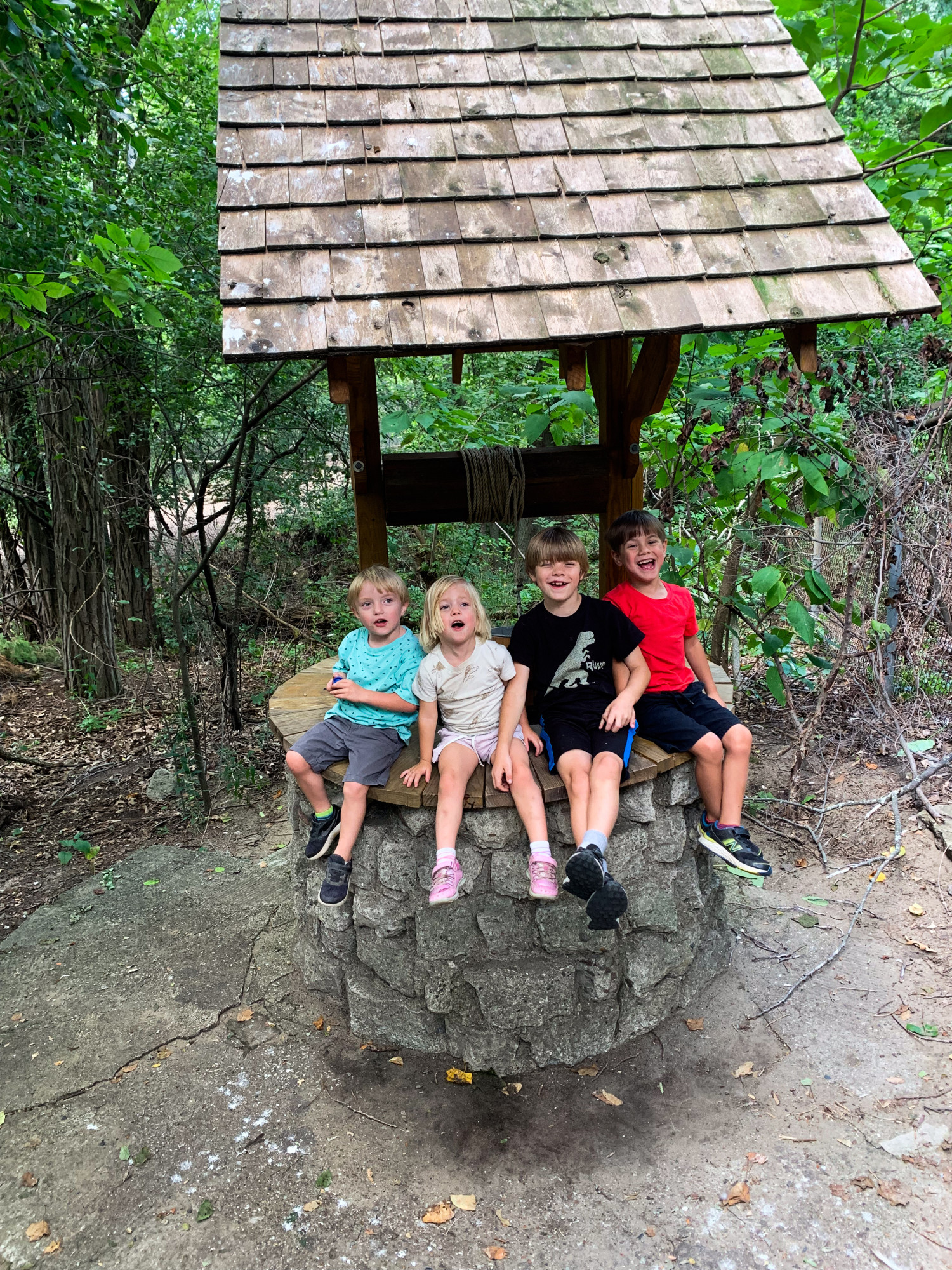 On our most recent trip I asked the kids to pose with the wishing well, because they all are our wish come true!