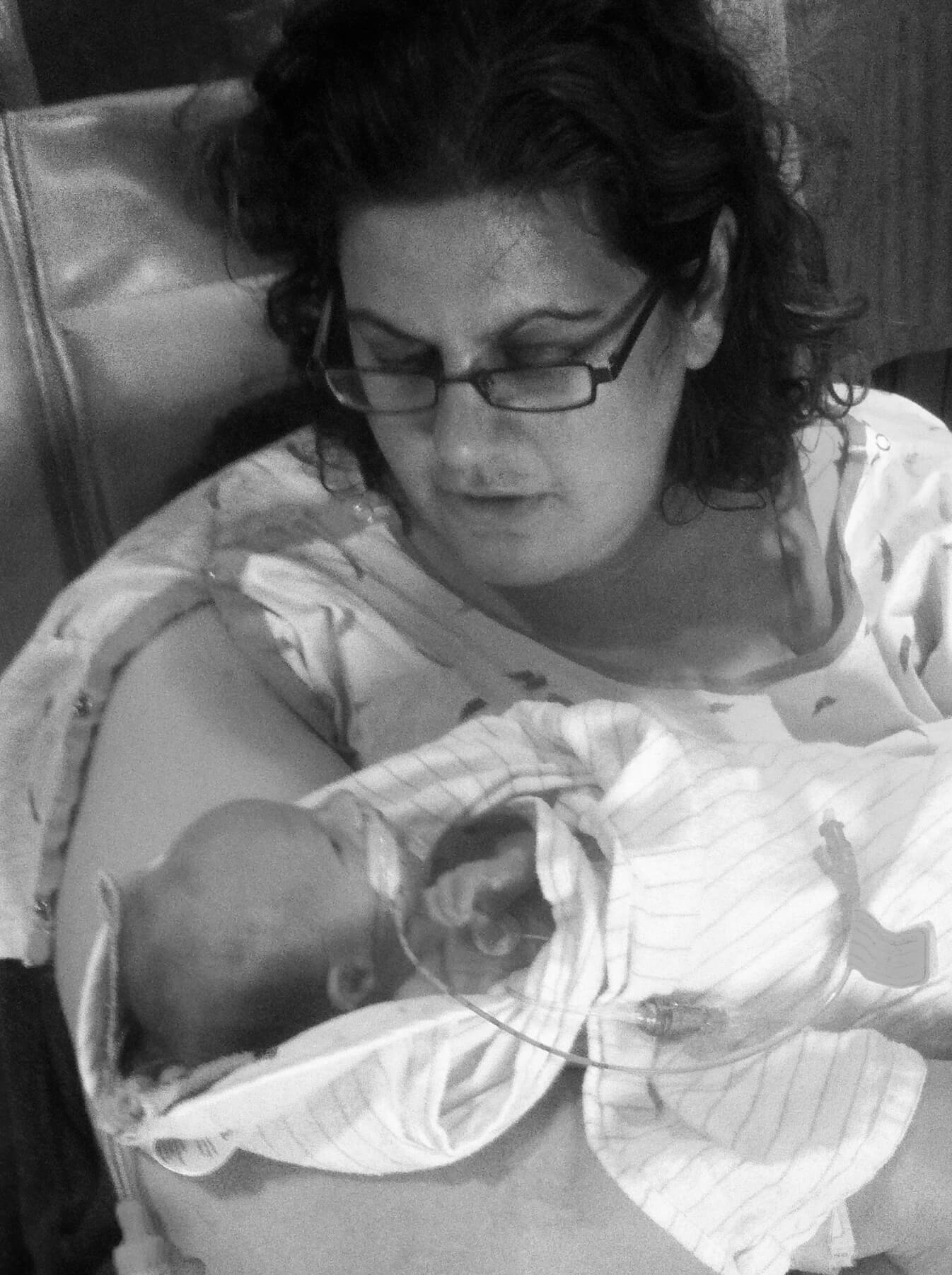 Baby J in his second day at the NICU, when I first was able to finally hold him!