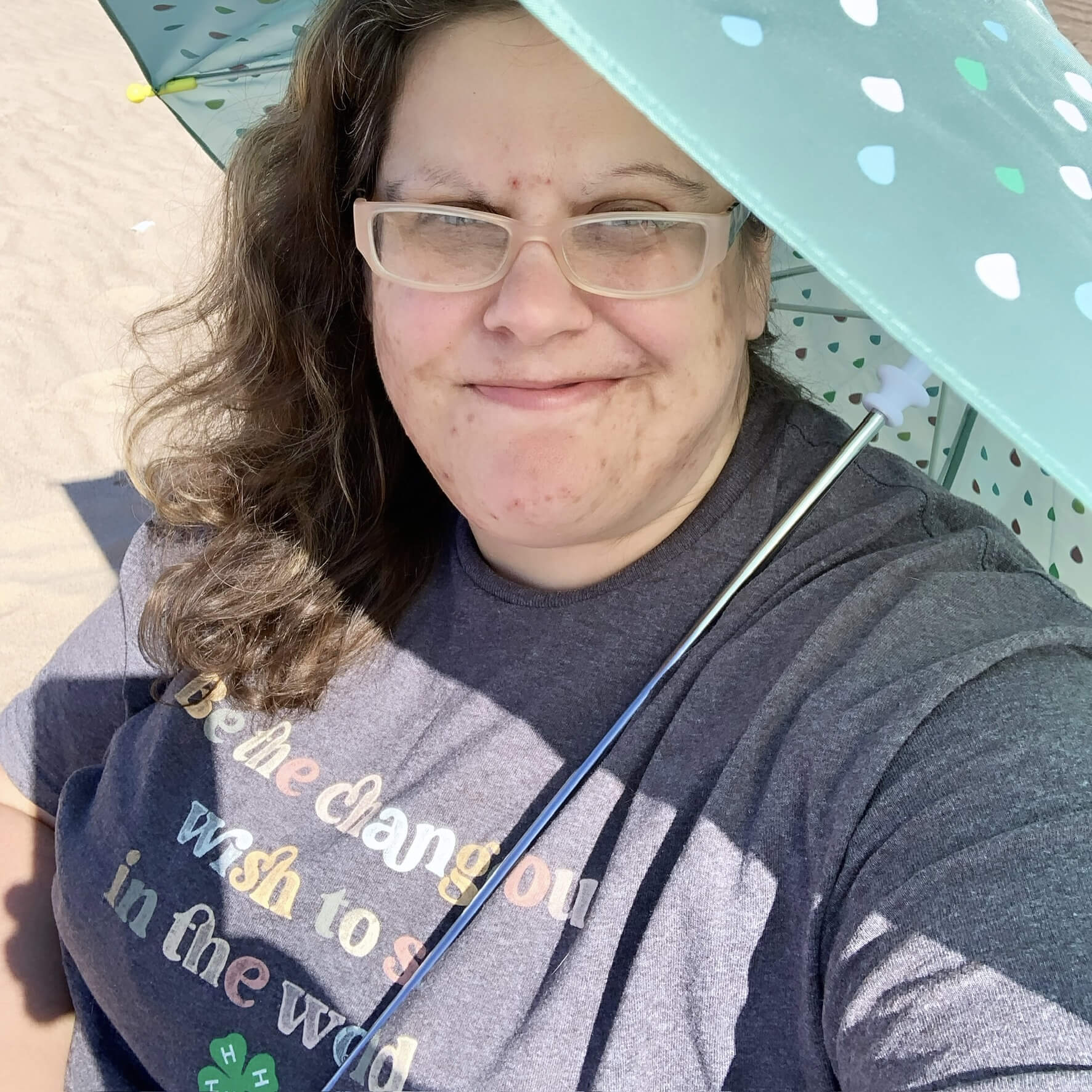 Enjoying my best life (for a few uninterrupted moments) on a beach on Lake Michigan!