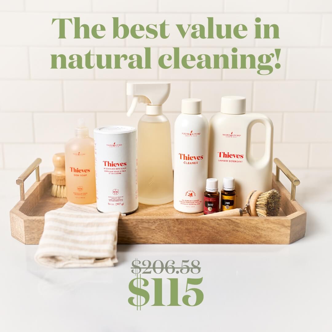  Thieves® Happy, Healthy Home Bundle displayed on a wooden tray with natural cleaning products, essential oils, and reusable spray bottle. Text overlay: “The best value in natural cleaning!”