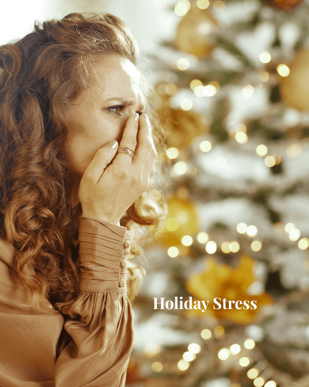  Woman looked stressed out sitting by a Christmas tree