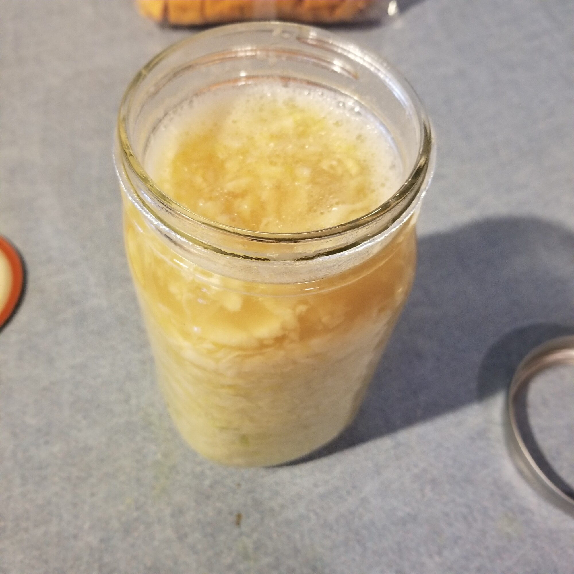 sauerkraut in jar with bubbles