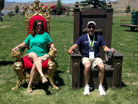 Curtis and I sitting in queen and King chairs