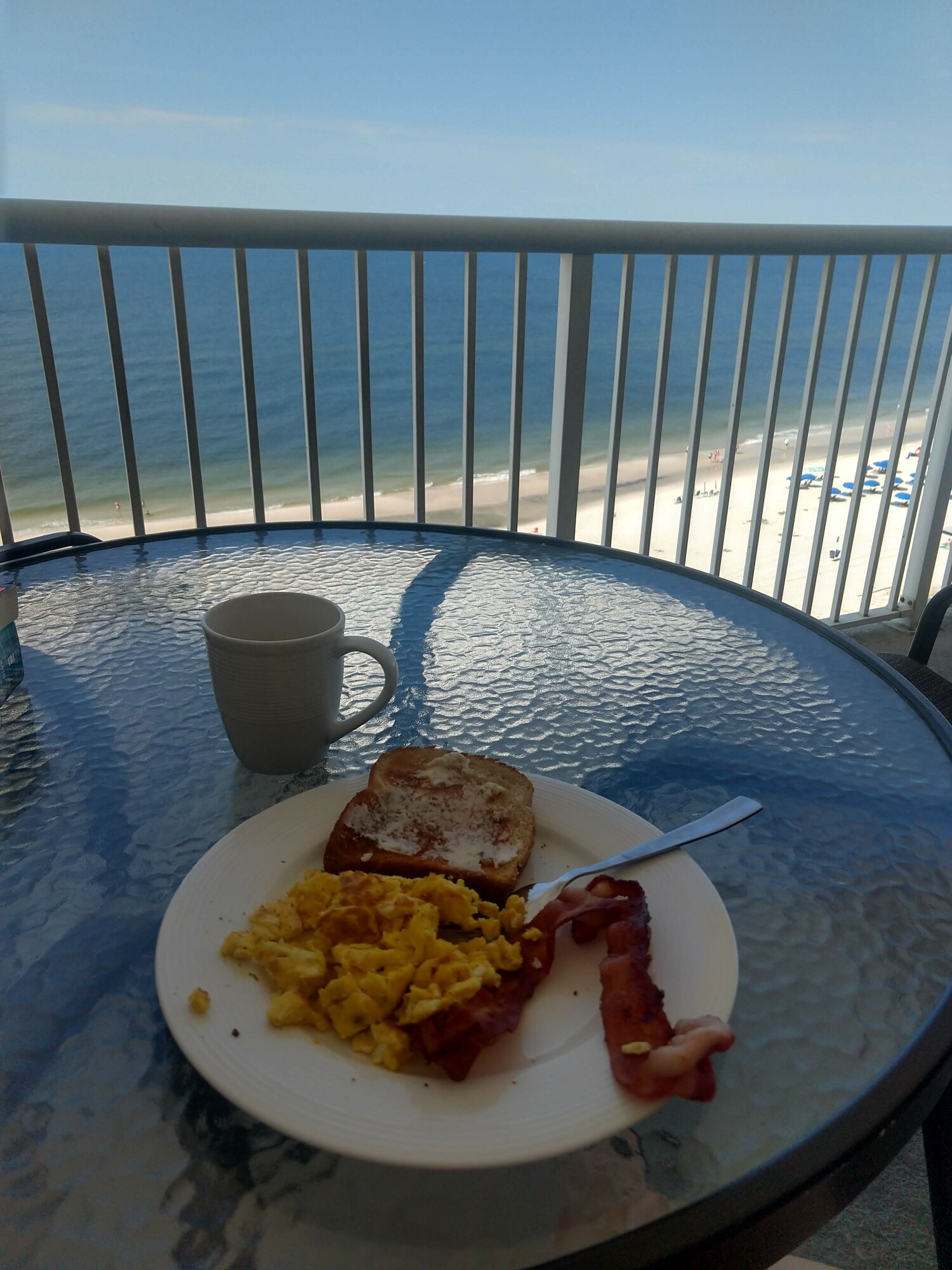 Breakfast on our patio overlooking the beach