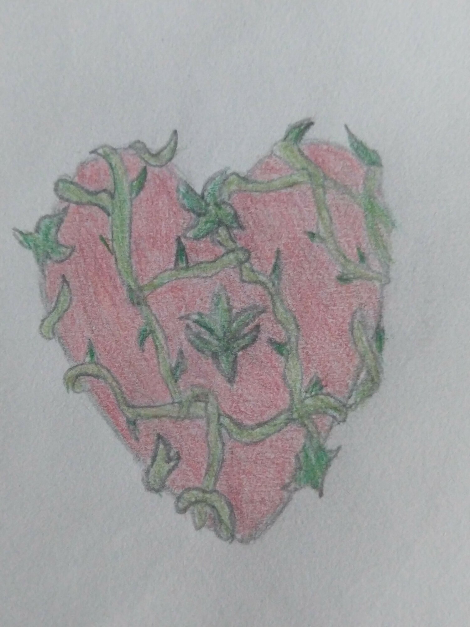 Heart covered in vines