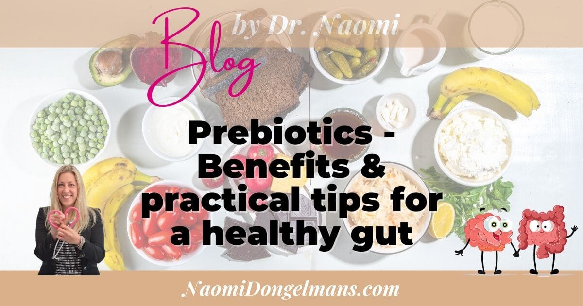 Fresh fruits and vegetables rich in prebiotics on a wooden table, highlighting the benefits of prebiotics for gut health.