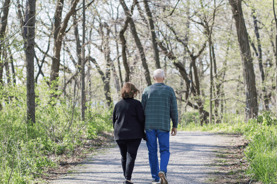 Couple walking on a path through the trees for post titled Unlock the "More" You've Been Searching For through Journals and essential oils