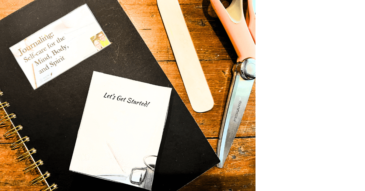 Folded one-page journal sitting on top of a black closed journal on a table next to a bone folder and scissors for a new blog post titled 4 Reasons to Create a One-Page Journal Today!