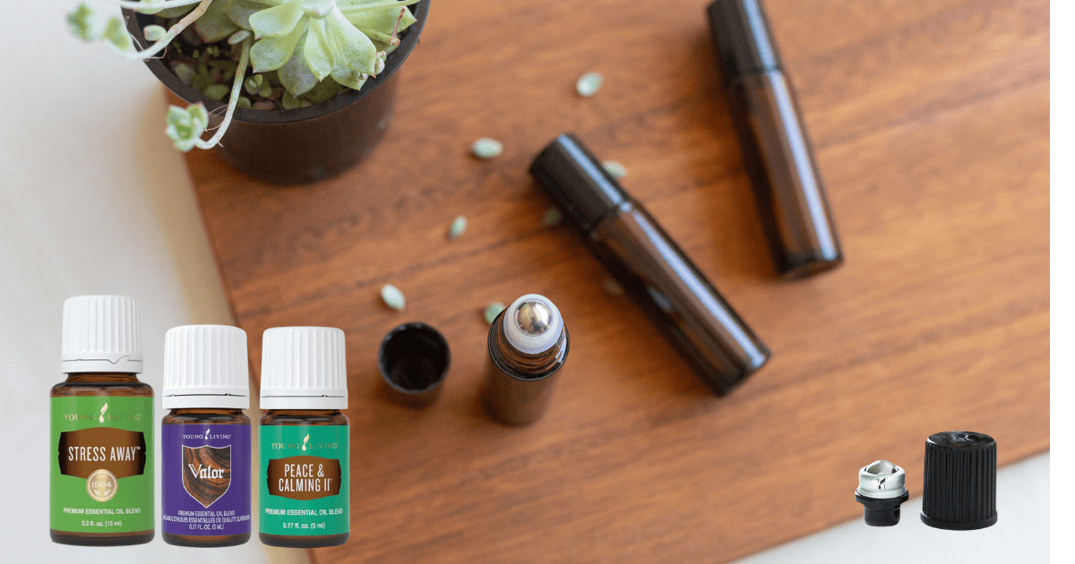  Three young living essential oils and three roller balls with a roller filement sitting on a cutting board  for our Bound to Journal blog post titled Traveling with Essential Oils: Your Ultimate Guide to Serenity on the Go