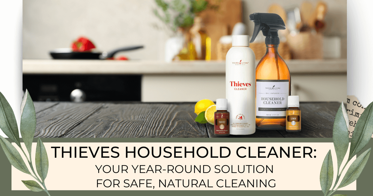 A kitchen island and counter with misc. kitchen items, a red pepper, and a green plant in the background and in the foreground is a bottle of Young Living Thieves Household Cleaner, a spray bottle of mixed cleaner, a bottle of Thieves essential oil and one of Lemon essential oil for a Bound to Journal Blog post titled Thieves Household Cleaner: Your Year-Round Solution for Safe, Natural Cleaning