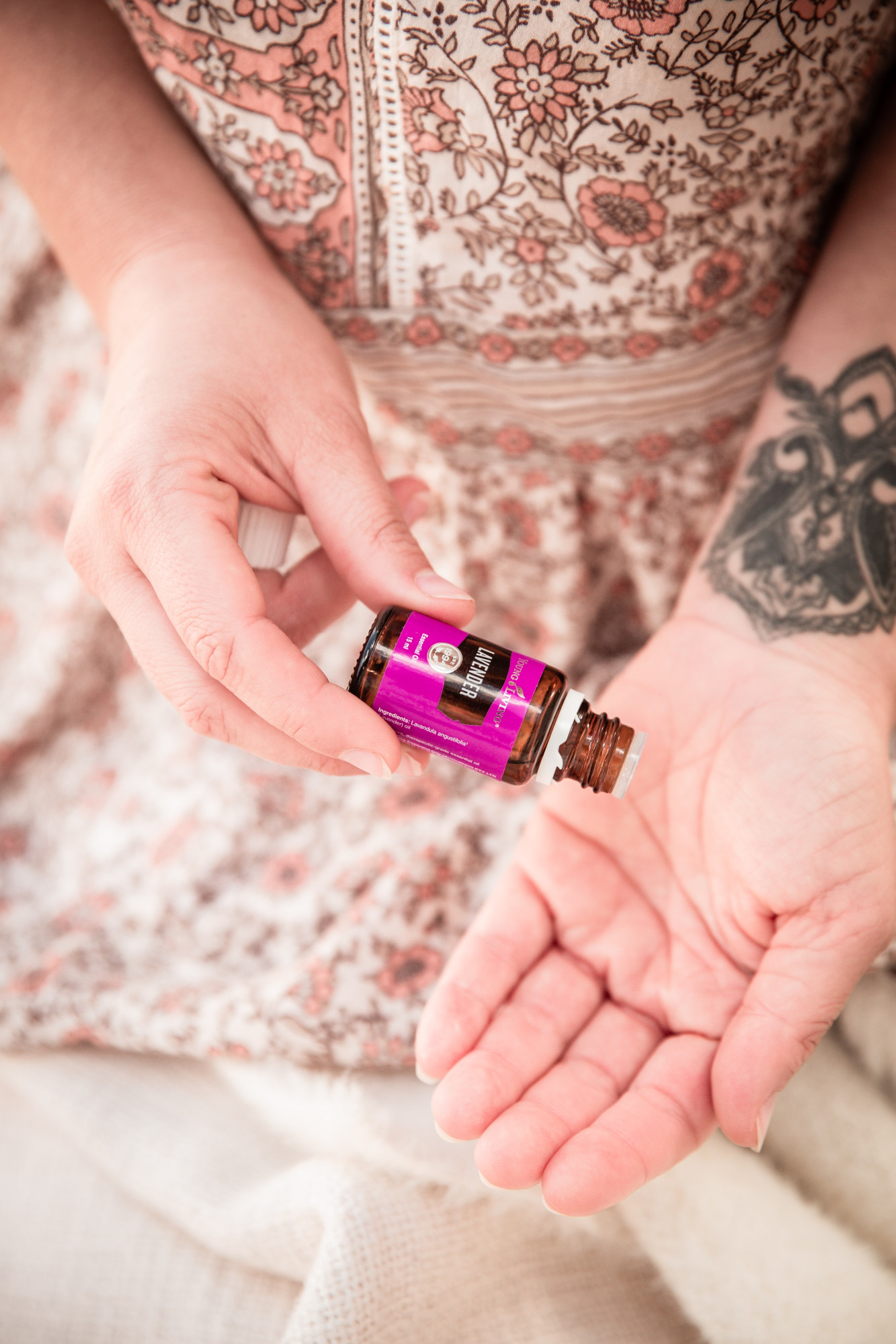 Applying Lavender essential oil topically 