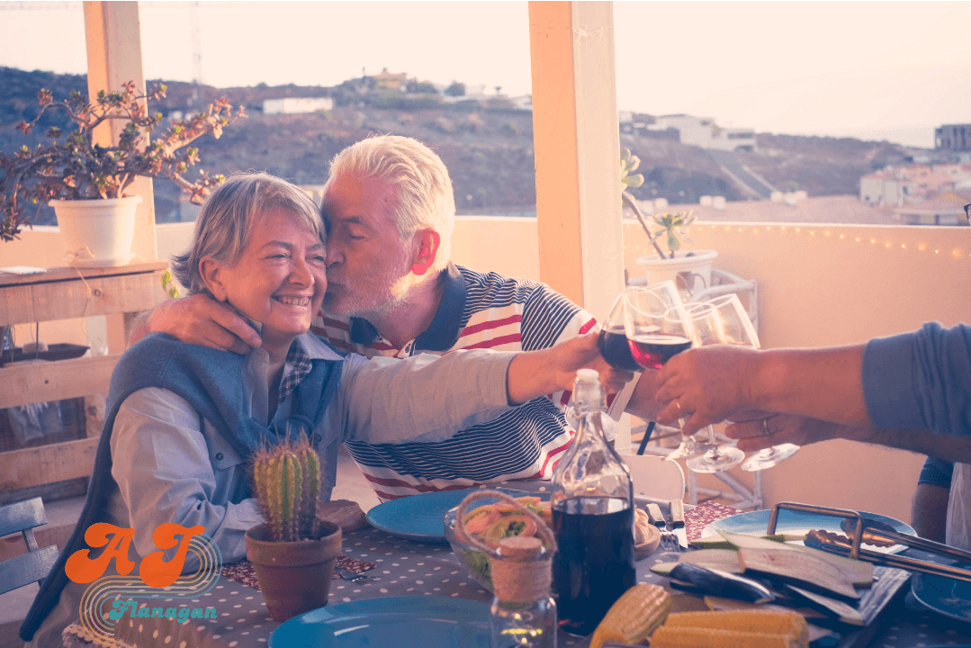 Group of middle-aged friends toasting with drinks