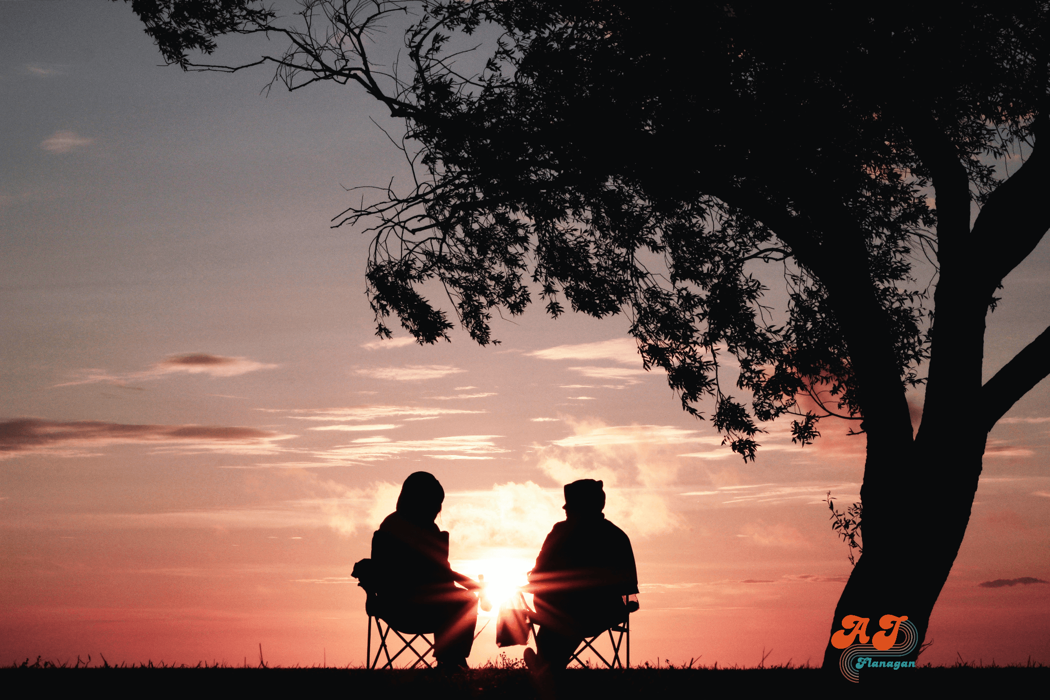 A couple enjoying a sunset together