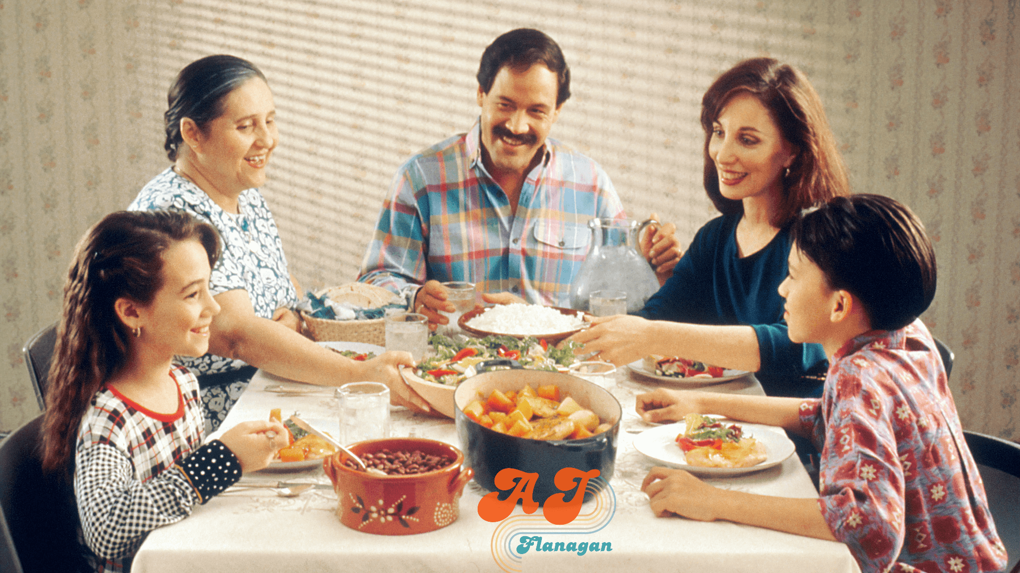 Happy family gathered around the dinner table