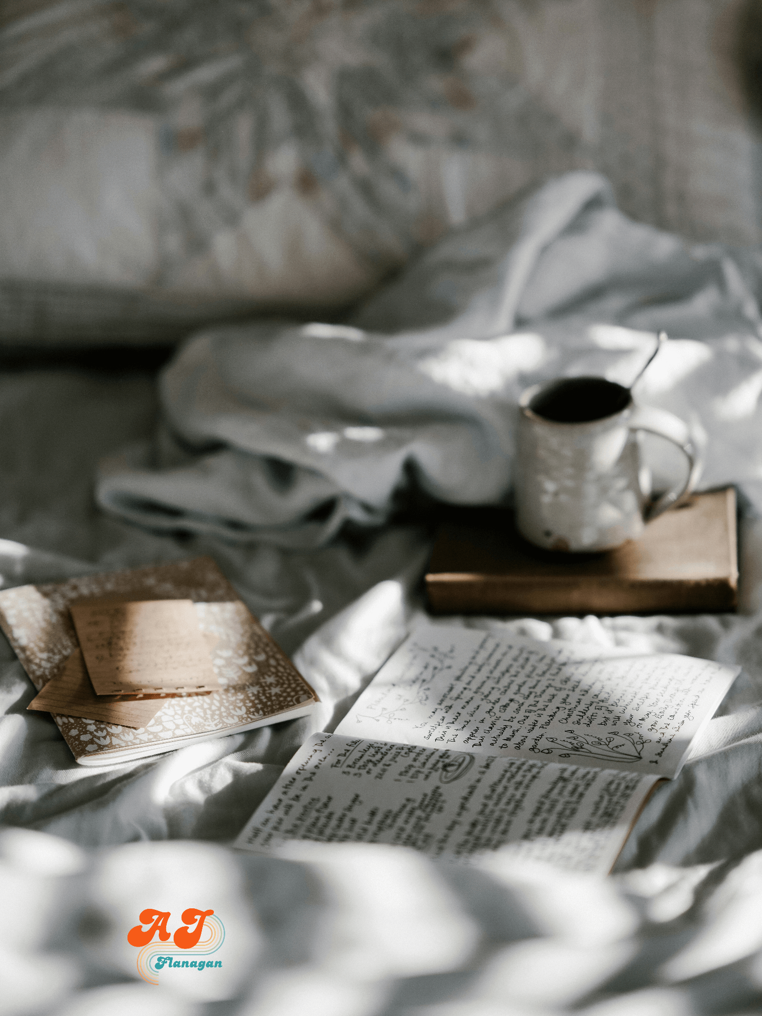 Morning coffee, bedding, and journal