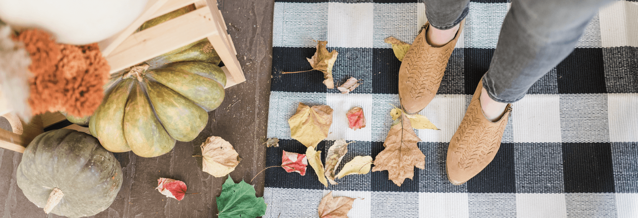   Image of fall porch with leaves and pumpkins